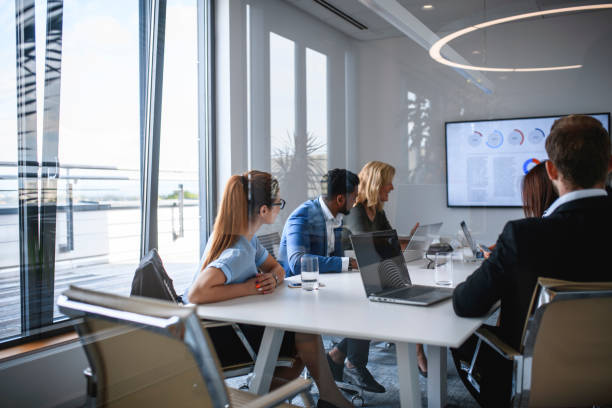 Vivify solutions team gathering to brainstorm mobile app development, web app development, and plenty more for your companies software needs.